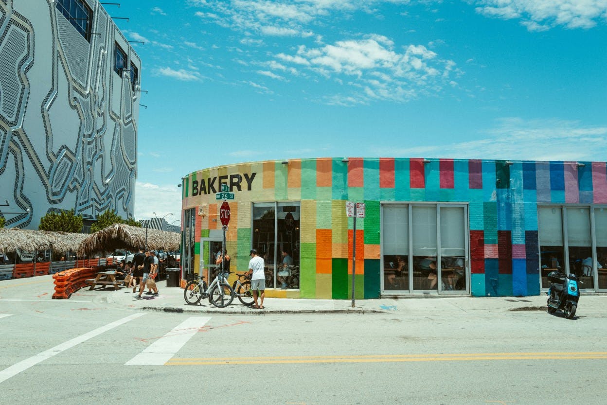 Rainbow colored walls in Wynwood during a sunny afternoon. 